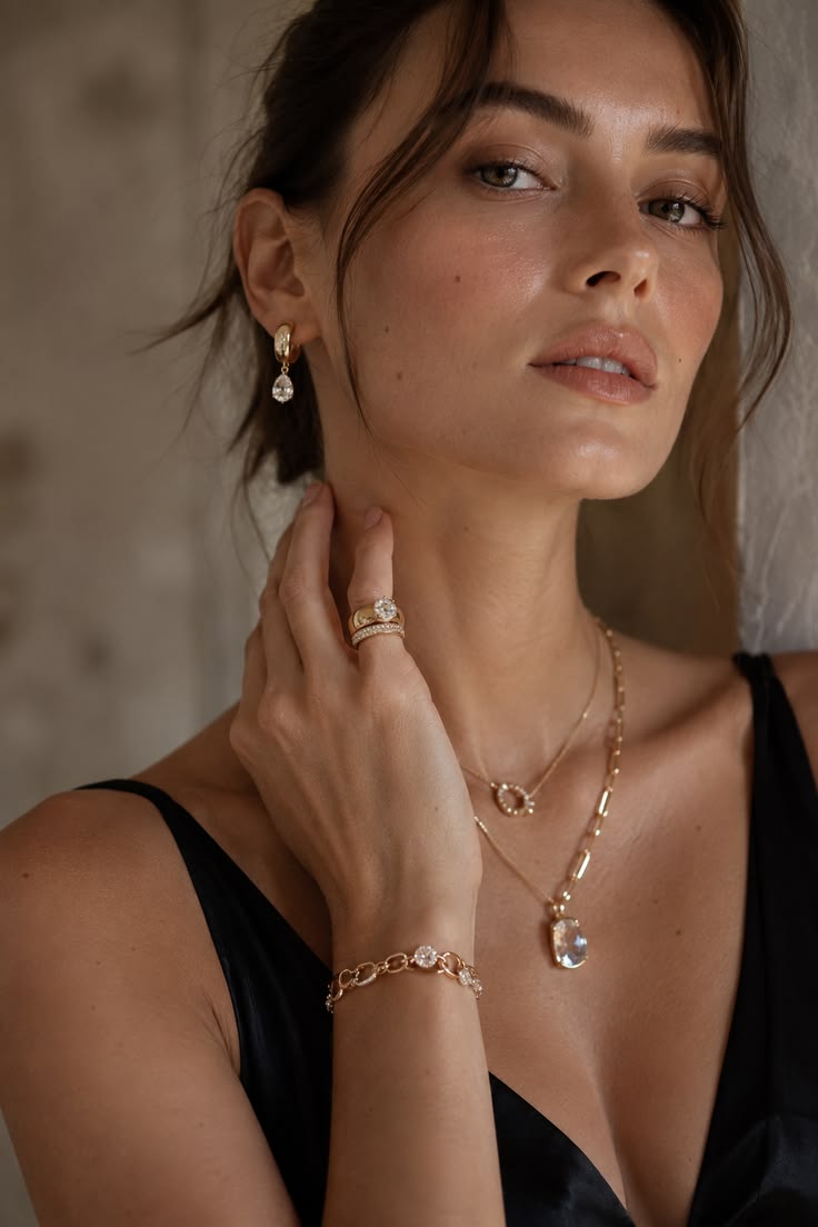 Home gold hoop & teardrop earrings – layered necklace & crystal bracelet aesthetic